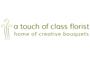 A Touch of Class Florist logo