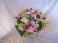 Utopian Blossoms - artificial wedding flowers logo