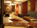 Milton Cater Oriental Carpets logo