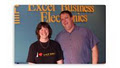 Excel Business Electronics logo