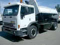Integrated Earth - Bobcat & Truck logo