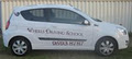 Wheels Driving School logo