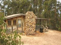 Wombat Valley Wild Country Cabins logo