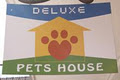 Deluxe Pets House logo