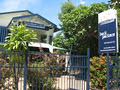 Dingo Moon Lodge Backpackers Accommodation Darwin logo