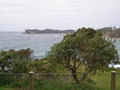 Beachfront over Malua Bay Beach logo