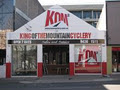 King Of the Mountain Cyclery (KOM) logo