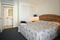 Macrossan house boutique holiday apartments logo
