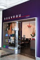 Nouveau Hair and Beauty logo