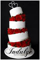 Indulge Designer Cakes logo