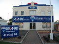 RE/MAX Precision logo