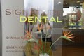 Signature Dental logo