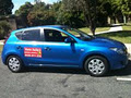 A. Auto Julia's Driving School logo